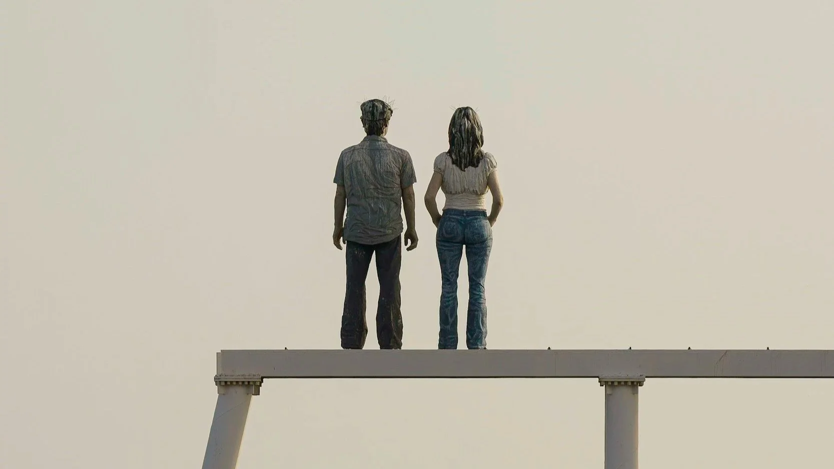 Couple sitting on a sofa looking away from each other